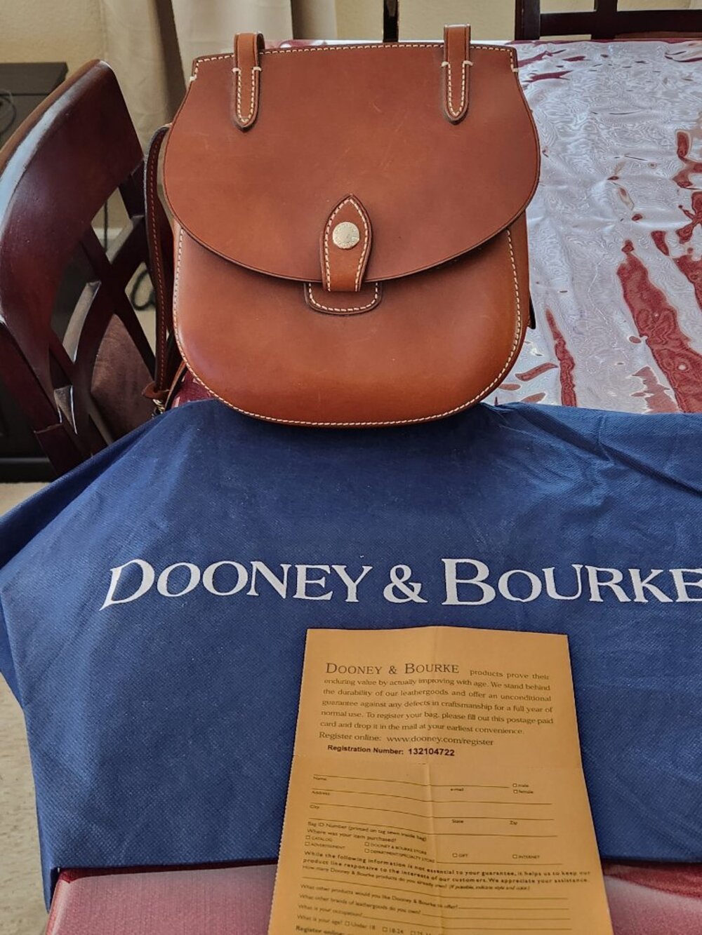 Dooney & Bourke Alto Happy Leather crossbody saddle bag